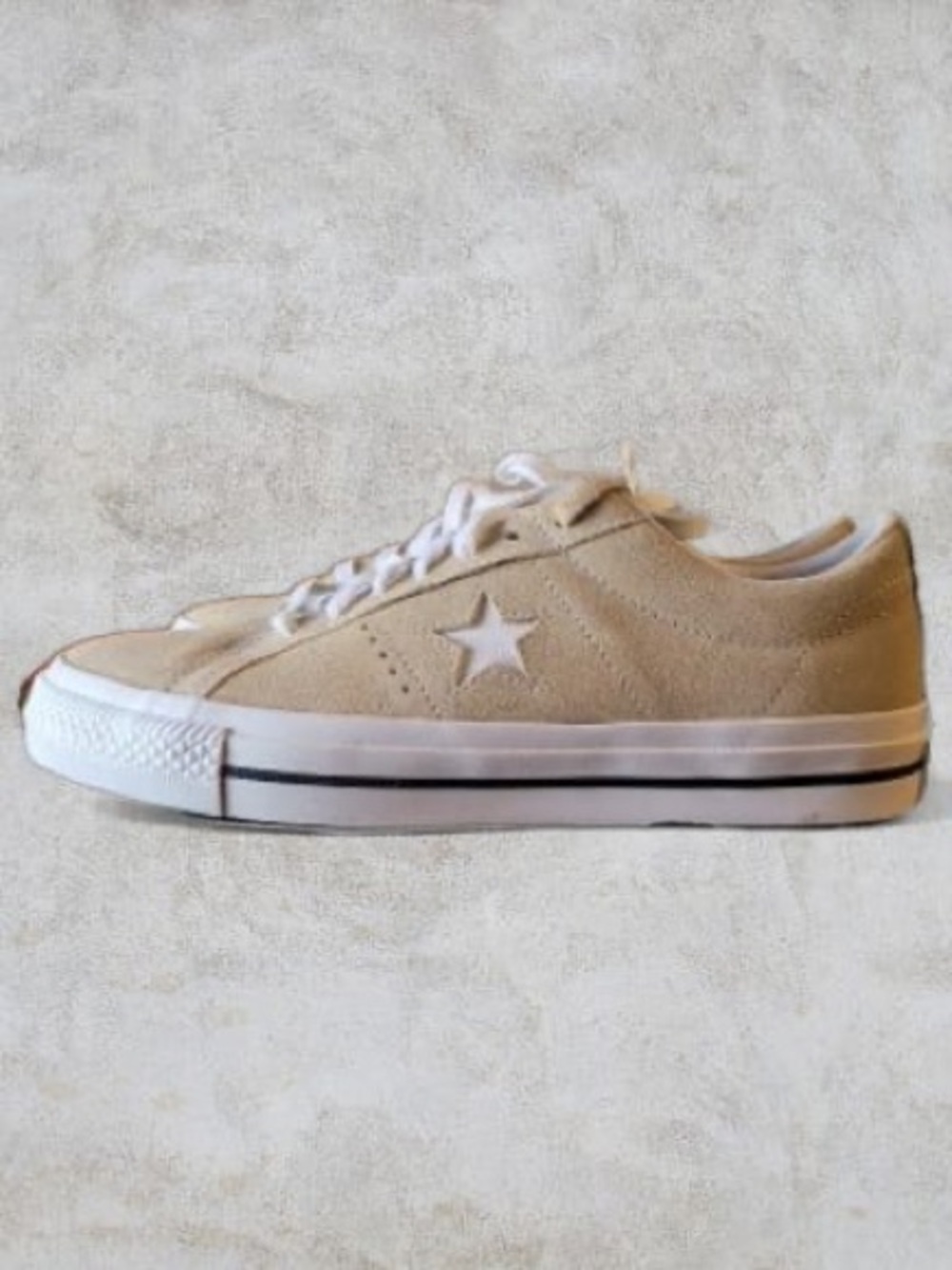 Converse One Star Pro, specifically in the "Oat Milk" or "Beige" colorway